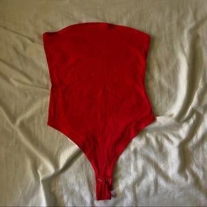 Red tube top bodysuit